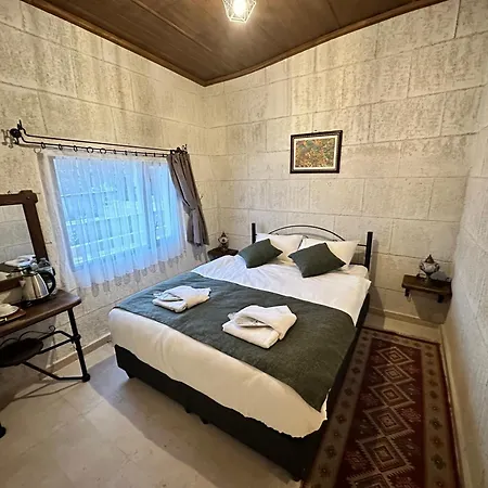 Turan Cappadocia Cave فندق غوريمِيه